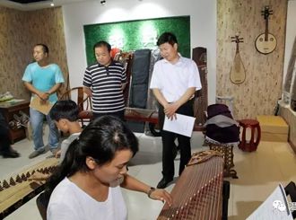焦作市人社局局长韩明华莅临弦昇乐器厂进行调研指导工作